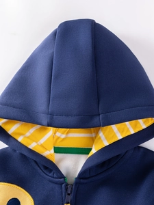 Navy boys hoodie with yellow striped hood lining and warm fleece interior for autumn wear