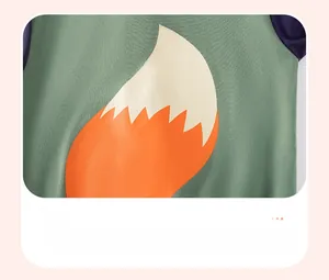 Detail of fox tail print on the back of a green hooded knit cotton toddler jacket