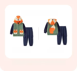 Detail of hooded zip-up sweatshirt with fox ear accents and matching cargo pants set