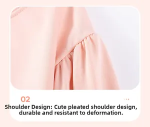 Detail of pink knitted girl's top featuring cute puffed sleeves and textured fabric
