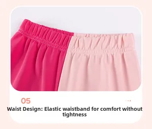 Detail of children's cotton pants with elastic waistband and contrast color stitching