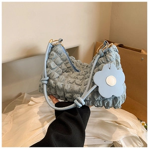 Light blue bubble puff flower handbag with ruffled texture and floral charm detail