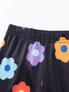 Floral print high waisted leggings for girls with bright flowers and elastic waistband