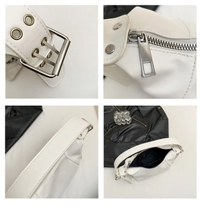 Close-up of white PU leather shoulder bag featuring silver metal eyelets and adjustable strap