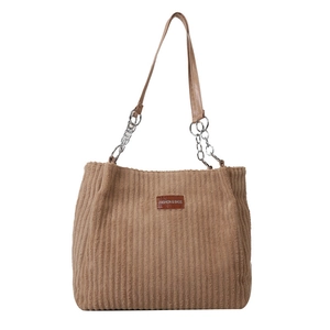 Large brown corduroy tote bag with chain strap and fashion patch on white background