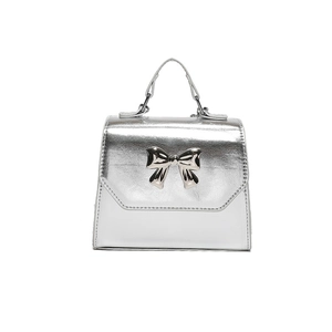Silver metallic small square handbag with reflective finish and oversized 3D bow accent