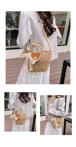 Close-up of woven straw tote bag with pearl clasp and large lace bow detail