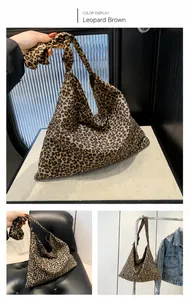 Detailed views of a leopard print canvas tote bag in leopard brown with knot strap design