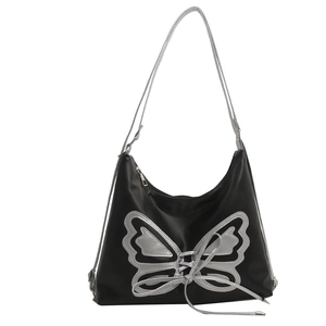 Minimalist black tote bag with silver butterfly embroidery and lace-up strap details