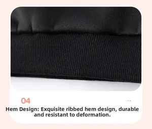 Detailed macro view of the ribbed hem design on a black fleece sweatshirt for boys