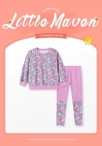 Detail of pink cotton autumn set for girls featuring cartoon rabbit prints and long sleeves