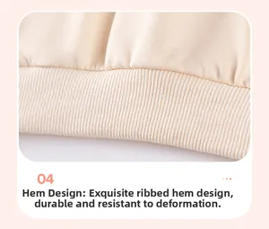Détail de l'ourlet côtelé sur ce sweat-shirt crème pour fille pour une meilleure tenue