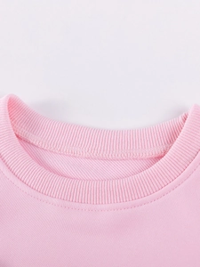 Sweat-shirt rose en coton pour filles avec col rond côtelé et finitions à double couture