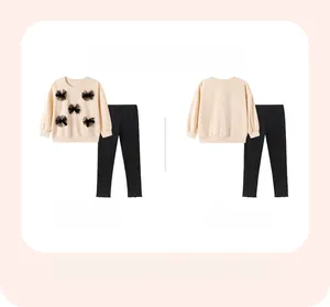 Ensemble d'automne deux pièces pour fille avec sweat beige à nœuds et legging noir ajusté
