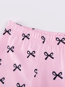 Pantalon d'automne rose pour filles avec taille élastique et nœuds noirs imprimés