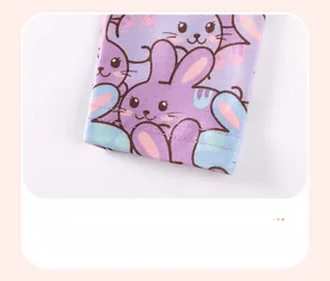 Macro detail of high-quality double-stitch hem on purple cartoon rabbit print trousers