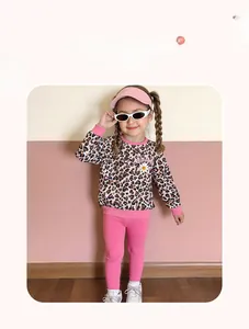 Toddler girl leopard print sweatshirt and pink pants set with smile floral graphic