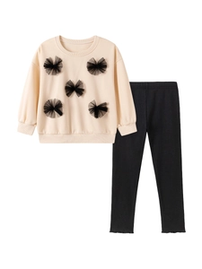 Ensemble fille avec sweat beige à nœuds en tulle et legging noir assorti deux pièces