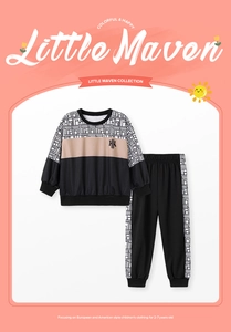 Detail of boys' autumn set with geometric maze pattern and HN embroidery on sweatshirt
