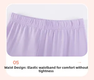 Close-up of comfortable elastic waistband on purple knit trousers for little girls