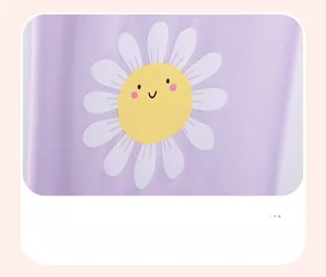 Detail of purple cotton girl's outfit with smiling daisy heat transfer print design