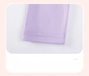 Detail showing high-quality double-stitched hem on lavender cotton children's pants