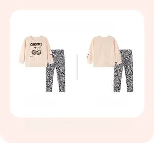 Front and back view of girls' long sleeve cherry print sweatshirt and leopard leggings