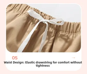 Detail of boys' khaki shorts with elastic waistband and adjustable white drawstring