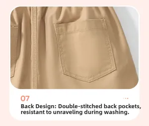 Detail of reinforced back pocket with double stitching on khaki cotton shorts for boys