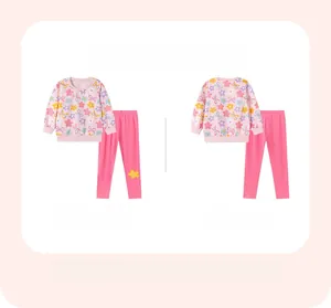 Vista dettagliata fronte e retro del completo rosa da bambina con motivi floreali