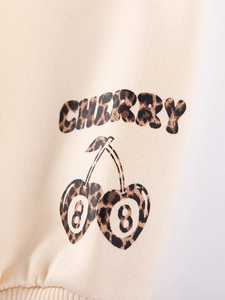 Girls long sleeve beige sweatshirt with leopard print cherry design and cherry lettering