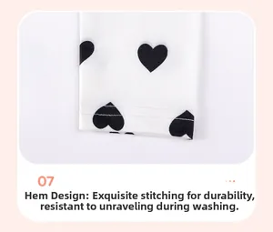 Close-up of heart print leggings cuff featuring durable double-stitch sewing detail