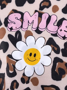 Girls long sleeve leopard print top with white daisy and pink bubble SMILE lettering