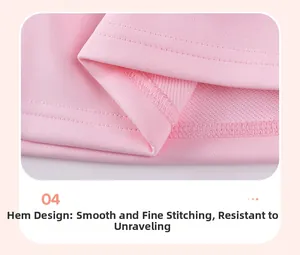 Détail de l'ourlet à double couture plate d'une robe rose à manches longues pour filles