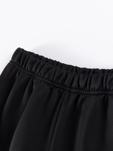 Pantalon d'automne noir pour garçon avec taille élastique et texture de maille fine