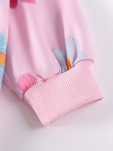 Pink long sleeve sweatshirt for girls with colorful floral patterns and ribbed cuffs