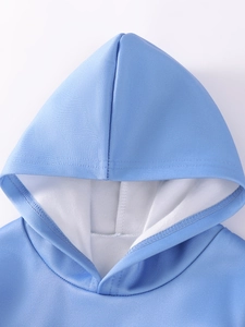 Light blue hooded girls' tracksuit with warm white fleece lining and detailed stitching