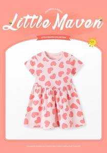 Detail of pink cotton girl dress with red heart print and soft pleated hem for kids