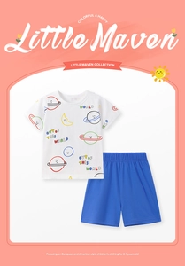 Flat lay of cotton kids summer set with cartoon space print t-shirt and blue shorts