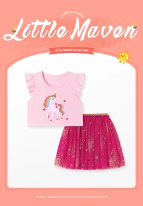 Detail of pink unicorn embroidery t-shirt and sparkly fuchsia sequin mesh tutu skirt