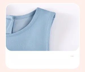 Close-up of sleeveless denim dress shoulder design with textured blue fabric detail