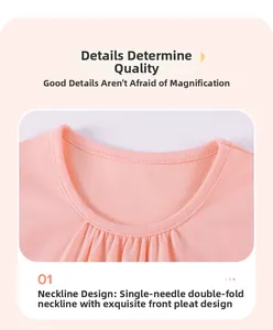 Detail of light pink cotton dress neckline with delicate shirring and binding finish