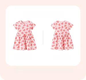 Detailed front and back views of girls' short-sleeve pink dress with red heart pattern
