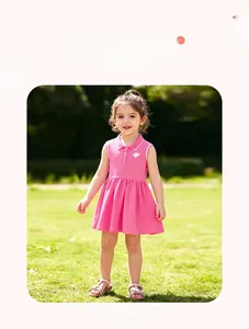 Pink cotton sleeveless girls polo dress with white heart embroidery and pleated skirt detail