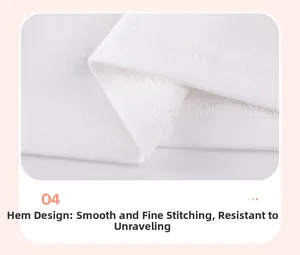 Detail of double-needle stitching on the hem of a white cotton cartoon car boy set