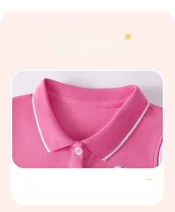 Detail of pink cotton polo collar with white stripe and high-quality fabric texture