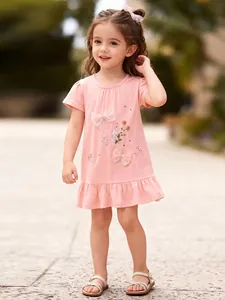 Pink cotton short sleeve dress for girls with flower embroidery and mesh bows details