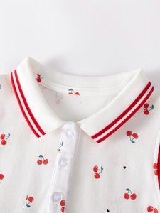 Robe polo blanche pour filles avec motifs cerises rouges et col rayé détail