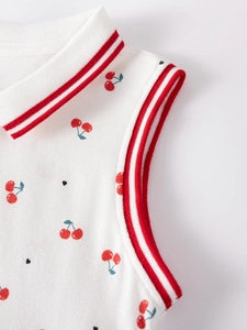 Robe polo sans manches blanche pour filles avec imprimé cerise et col côtelé rayé