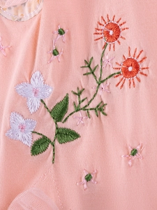 Pink cotton girls dress with detailed floral embroidery and soft mesh pleats detail